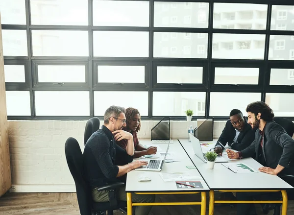 Theyre Group Focused Individuals Group Designers Working Desk Office — Stockfoto