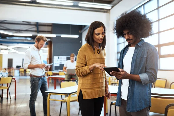 Let Check Out Two Young Businesspeople Looking Tablet Office Colleagues — Zdjęcie stockowe