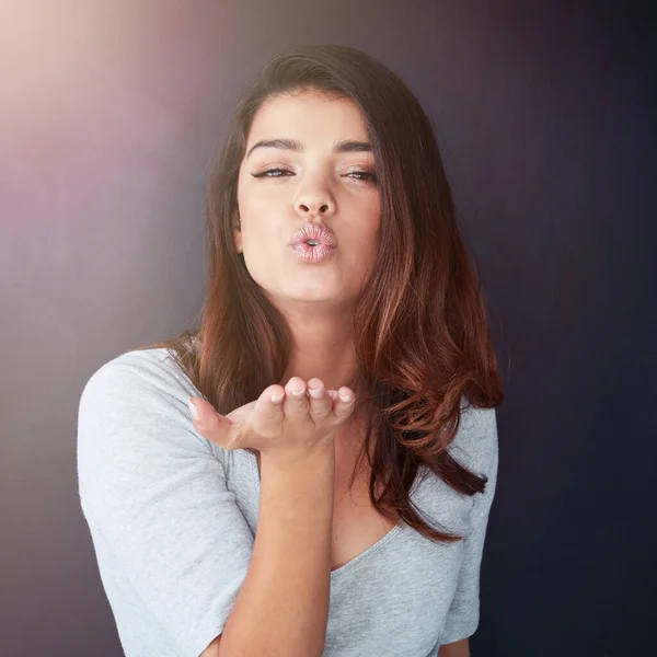 Heres Kiss You Cropped Portrait Beautiful Young Woman Blowing Kiss — Stock Photo, Image