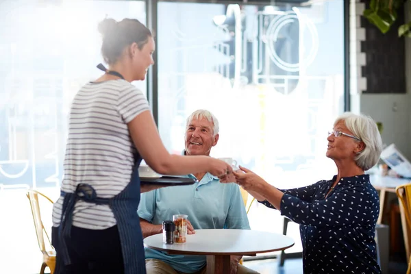 Service Here Friendly Efficient Senior Couple Being Served Waitress — Stockfoto