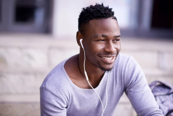 Music Brings Harmony World Young Man Listening Music While Sitting – stockfoto