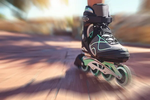 Wheeling Promenade Closeup Shot Young Womans Feet Rollerblades Speeding Park — Stockfoto
