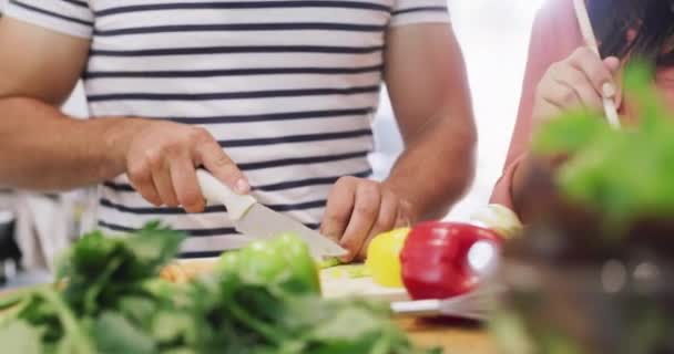 Young Couple Cooking Healthy Food Lunch Dinner While Eating Together — Vídeos de Stock