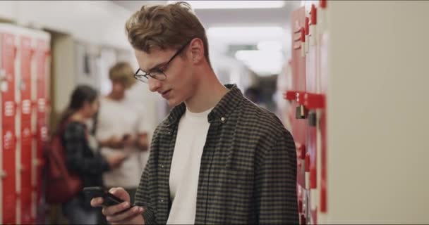 Sad Teenager Reading Phone School Cyber Bully Online High School — Stock video