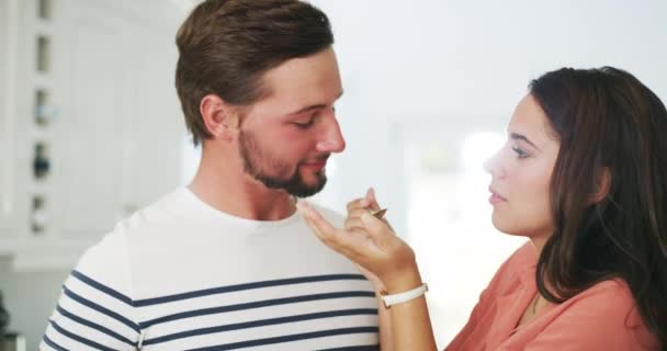 Happy Woman Giving Her Man Food While Cooking Smile House — Vídeos de Stock