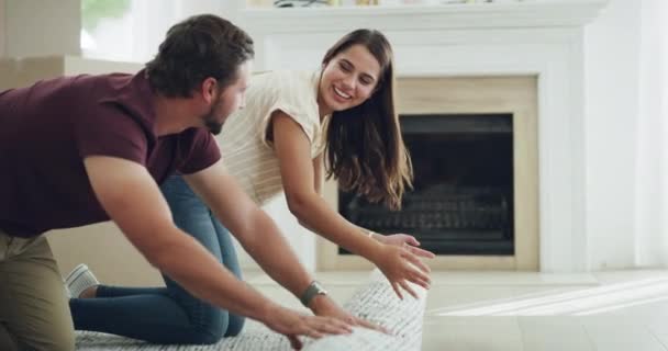 Teamwork Family Happy Couple Rolling Out Carpet Floor New Home — Stock Video