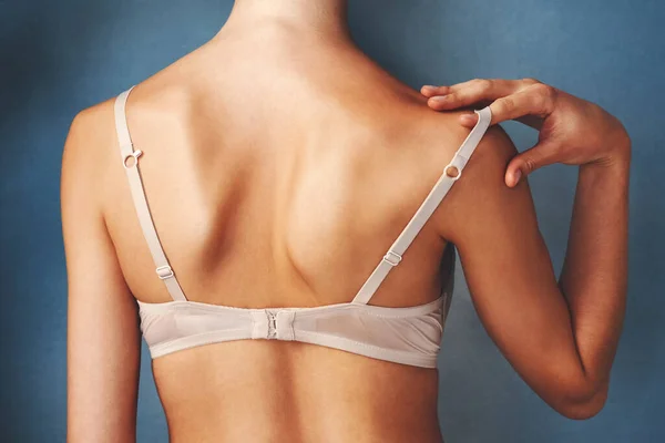 Straps Might Need Adjusting Cropped Studio Shot Young Woman Removing — Zdjęcie stockowe