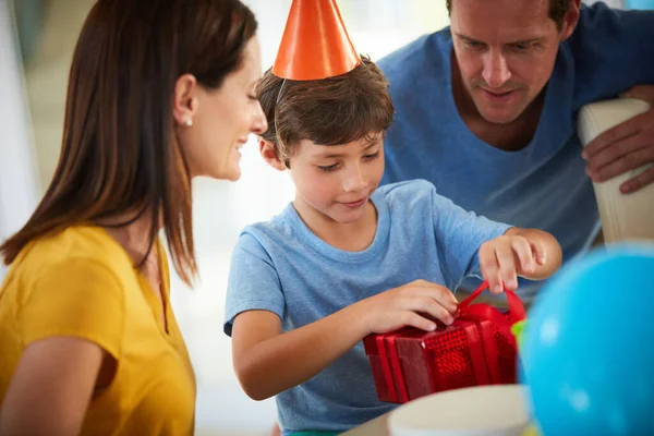 Best Part Birthdays Prezzies Little Boy Opening His Birthday Presents —  Fotos de Stock