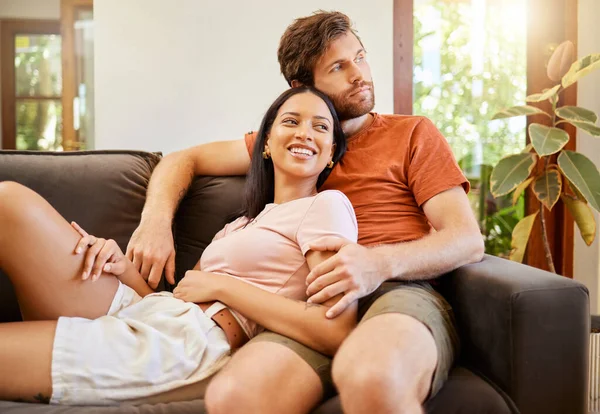 Happy Love Interracial Couple Smile Looking Away Relax Sitting Couch — Foto Stock