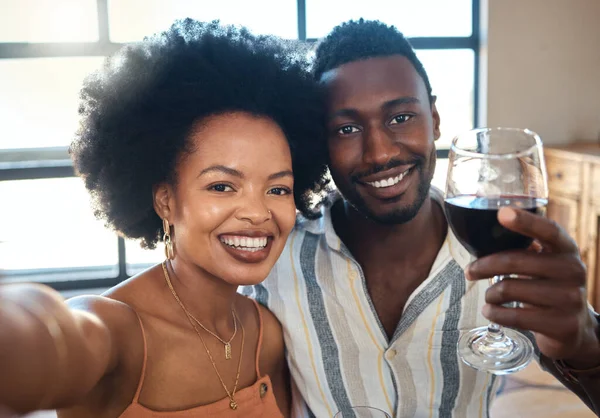 Couple selfie for social media to celebrate with wine glass, champagne and alcohol drinks for happy relationship on date together in a cafe restaurant. Portrait of love, relax and smile black people.