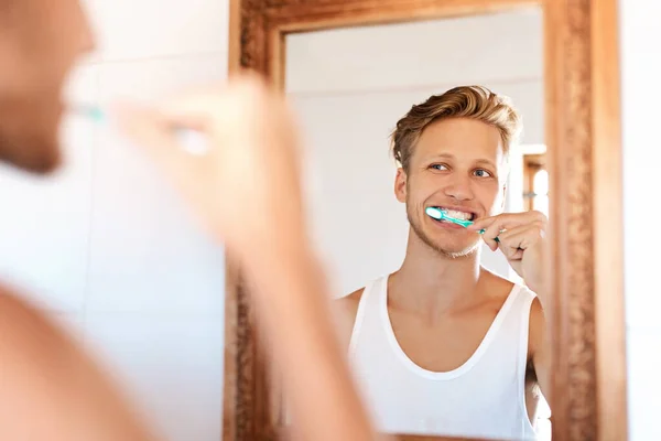 Theyre Gonna Shine Bright Young Man Brushing His Teeth Home — Fotografia de Stock