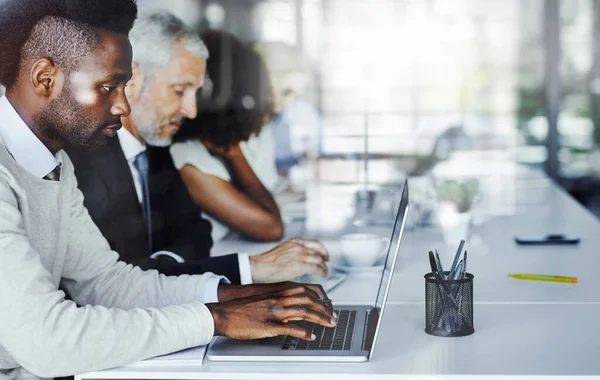 Doing Some Research Subject Meeting Businessman Using His Laptop While — Foto de Stock