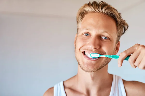 Dental Hygiene Utmost Importance Portrait Young Man Brushing His Teeth — Fotografie, imagine de stoc