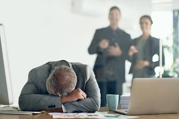 Bullying Finds Its Way Workplace Dejected Businessman Lying His Arms — Foto Stock