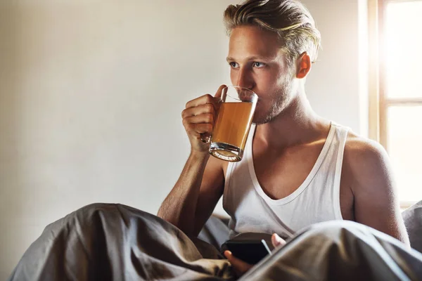 Tea Time Bed Handsome Young Man Using His Cellphone While — Stock fotografie