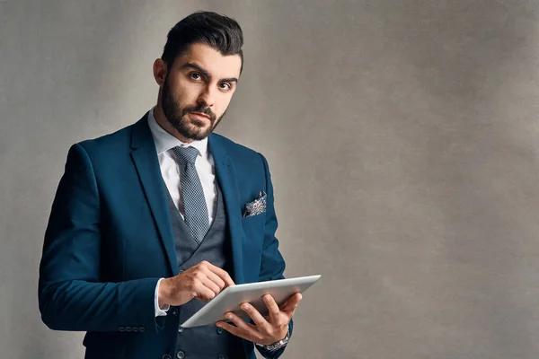 Its Smartest Business Tool Studio Portrait Stylishly Dressed Young Businessman — Stockfoto