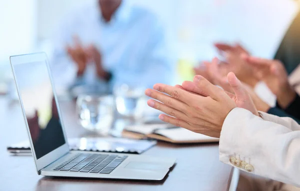 Hands clapping, meeting and laptop with business team at office room table working. Success, teamwork or collaboration and work on corporate finance strategy, planning and innovation with computer