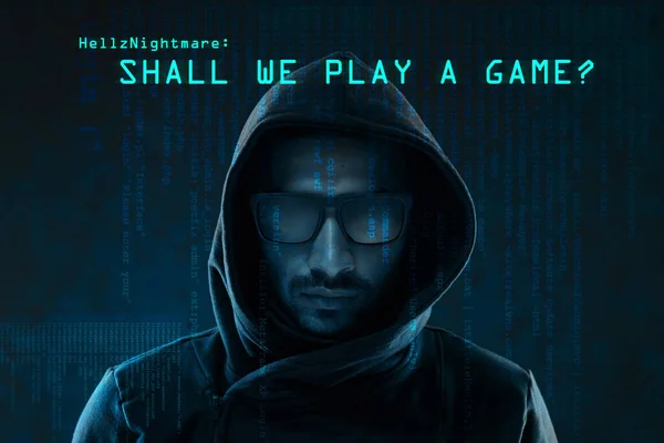 You cant win against him. Portrait of a menacing computer hacker posing against a dark background in studio