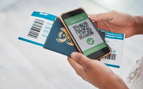 Covid passport, travel regulations and medical result on mobile phone. Foreign flight and virus control for safety of airport passenger. Protection for people at risk to get sick with corona