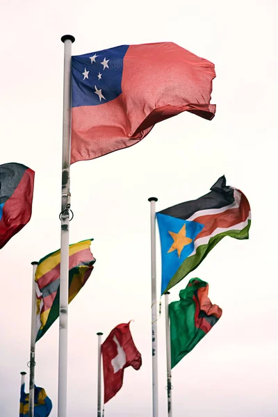 Representing Many Nations Samoan Zimbabwean Sudanese Swiss Swedish Flags Blowing — Stock Photo, Image