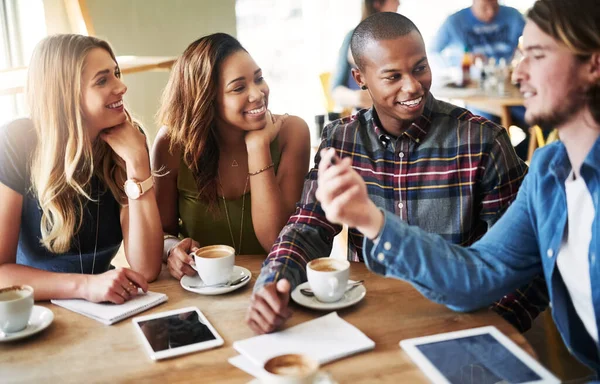 The best of friends make the best of times. a group of friends catching up over coffee in a coffee shop