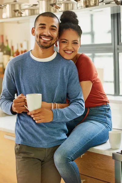 Marriage vibes. Portrait of a happy young couple embracing at home