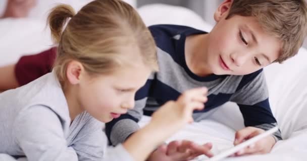 Children Tablet Online Game Digital Learning Education Together Bed While — Stockvideo