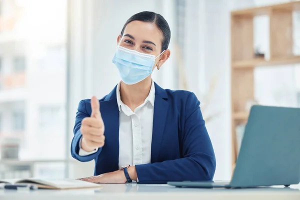 Thumbs up, mask portrait and Covid safety business woman with face protection for serious illness. Corporate virus policy procedure for good health, hygiene and satisfaction of employees