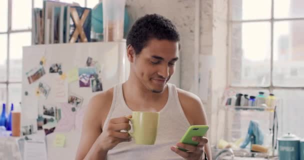 Man Drinking Coffee Phone Kitchen While Typing Text Message His — Video Stock