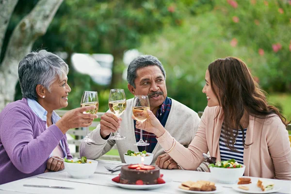 Another year of love, life and family. a family enjoying a birthday lunch outside