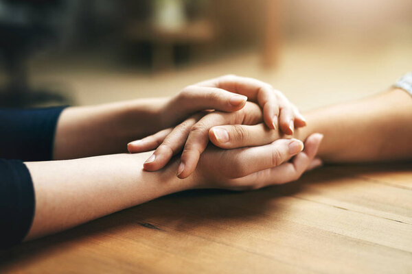 Small gestures of kindness go a long way. Closeup shot of two unidentifiable people holding hands in comfort