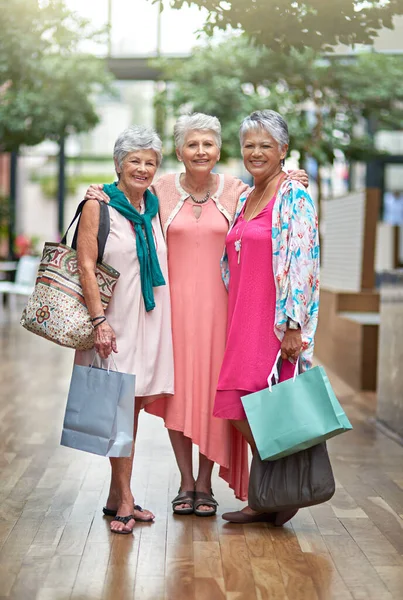 Its time to get shopping. Full length portrait of a three senior women out on a shopping spree