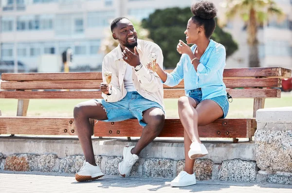 Happy Black Couple Eating Ice Cream Beach Bench Together Smiling — стокове фото