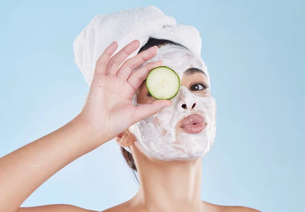 Skincare, facial and wellness skin product of a woman with face cream and mask. Portrait of bathroom shower morning routine for beauty, care and health lifestyle of a female feeling silly.