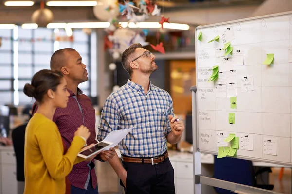 Business Idea Looks Interesting Group Coworkers Brainstorming Whiteboard — Stok fotoğraf