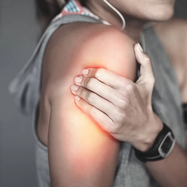 Inflammation Strikes Young Woman Holding Her Injured Shoulder Thats Highlighted — Foto de Stock