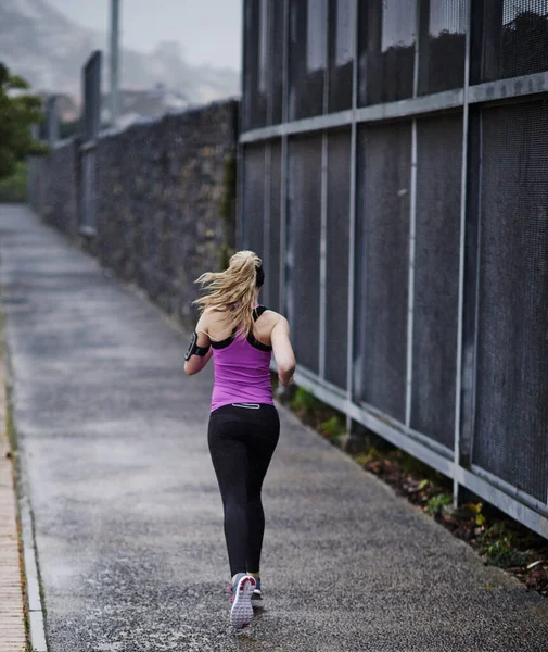 Path Fitness Rearview Shot Young Woman Running Path — Stockfoto