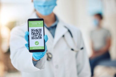 Covid vaccine barcode on phone, digital passport on screen of smartphone for security and future travel and online certificate for insurance. Hand of doctor with document on web for safety and health.