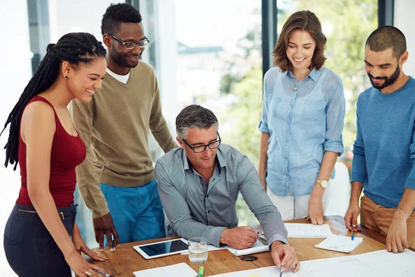 The dream works with teamwork. a group of architects in the boardroom