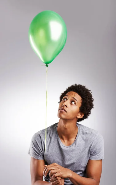 Adventure Out Young Man Holding Balloon Gray Background — Foto de Stock