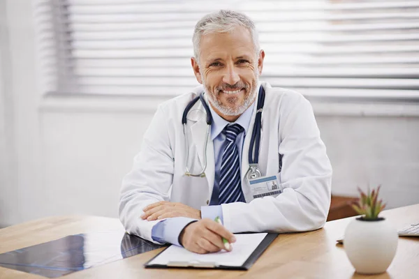 Your Health What Works Portrait Mature Male Doctor Sitting His — Foto Stock