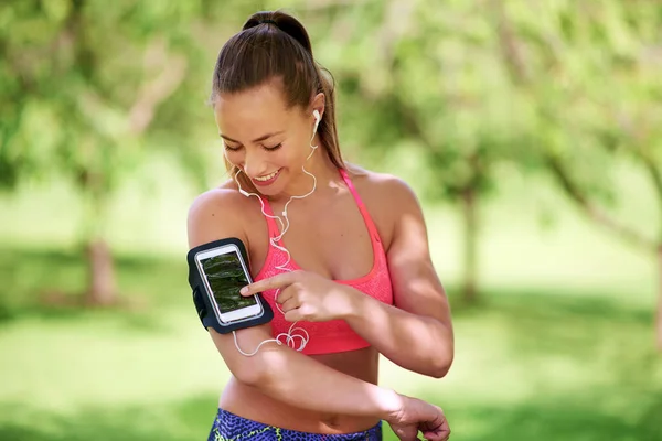 Lose Yourself Music Young Woman Arranging Her Playlist Her Workout — Fotografia de Stock