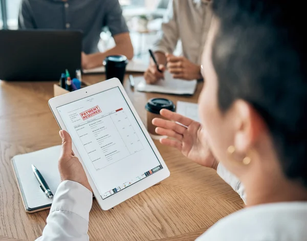 Hands of business woman with tablet, debt or late payment in a meeting. Bank loan, tax invoice or negotiating price reduction on goods, customer or client purchase on tech in corporate office