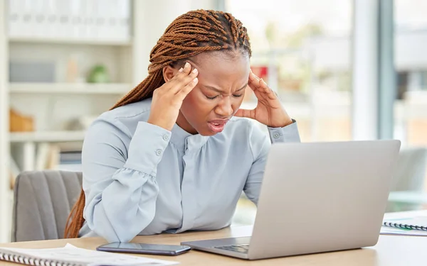 Stress, headache and black woman with laptop in office with confused, burnout or anxiety face after mistake on project. Creative startup business worker frustrated with technology 404 glitch on email.