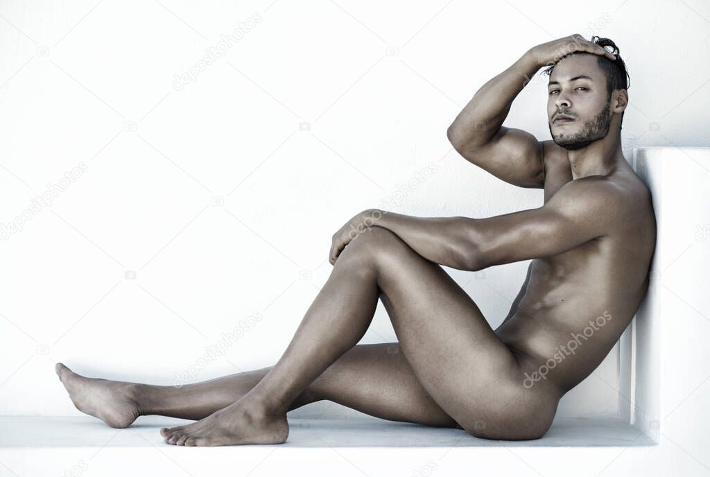 No clothes, no problem. a handsome young man posing nude