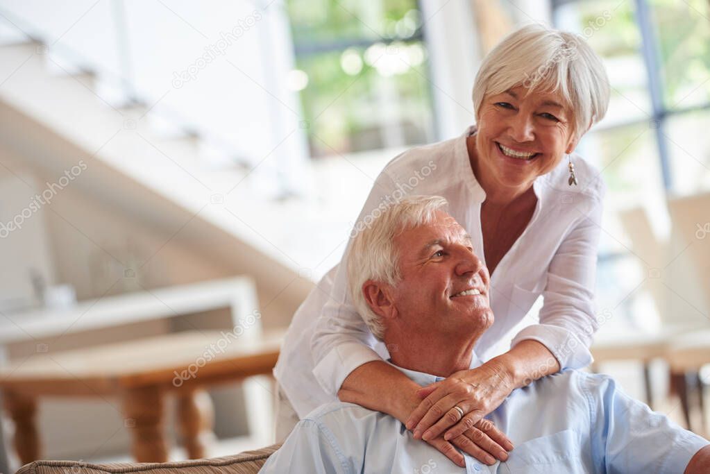 True love isnt found, its built. a happy senior couple at home