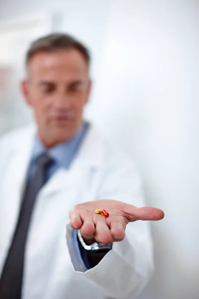Finally Cure All Closeup Shot Doctor Holding Two Capsules His — Stock Photo, Image
