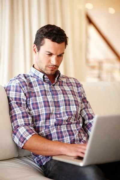 Enjoying Broadband Connectivity Handsome Sitting Couch Working His Laptop Stock Picture