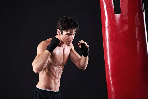 100 Percent Focused His Punch Studio Shot Young Mixed Martial — Stock Photo, Image