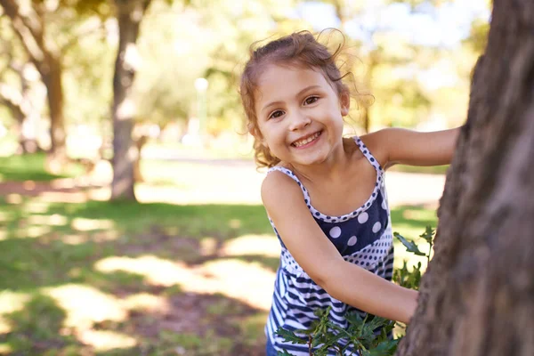 Youll Never Catch Portrait Little Girl Playing Hide Seek Park Royalty Free Stock Images